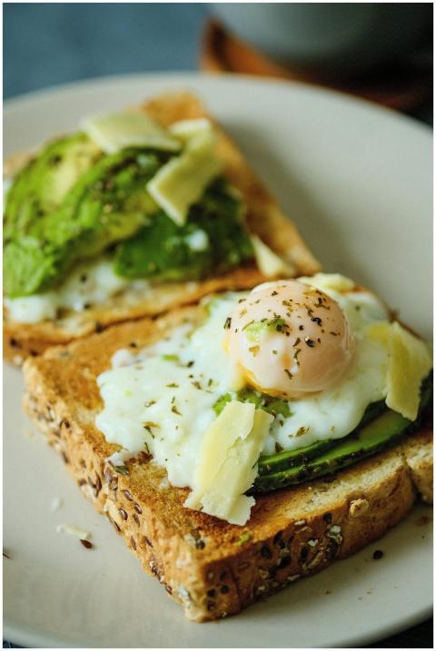 Savor the taste of creamy avocado toast topped wit