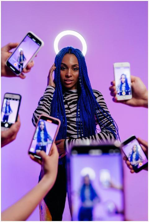 An African American woman posing confidently, surr