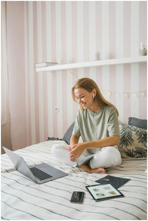 Woman enjoying an online education session while s