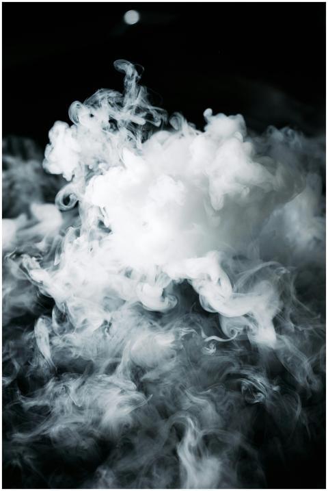 Abstract photography of swirling white smoke on a