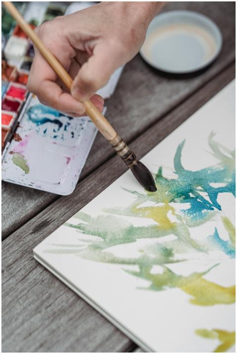Close-up of watercolor painting process with a vib