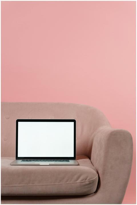 A minimalist setup featuring a modern laptop with