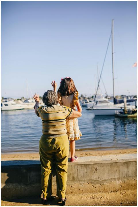 A grandmother and granddaughter enjoy a sunny day