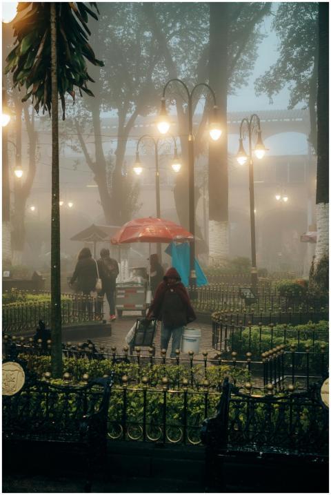 Misty urban park scene in Huauchinango, Mexico wit