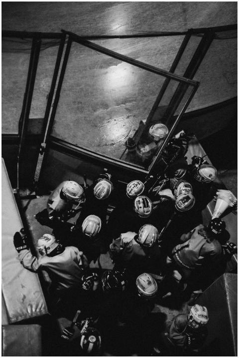 Aerial black and white shot of an ice hockey team