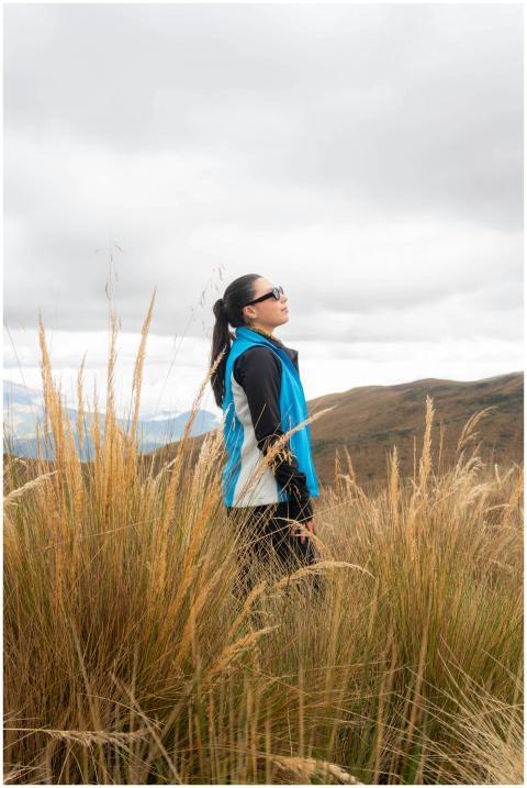 Woman enjoying outdoor scenery in the highlands ne