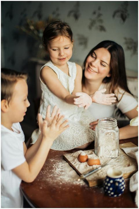 A joyful family moment with mother and children ba