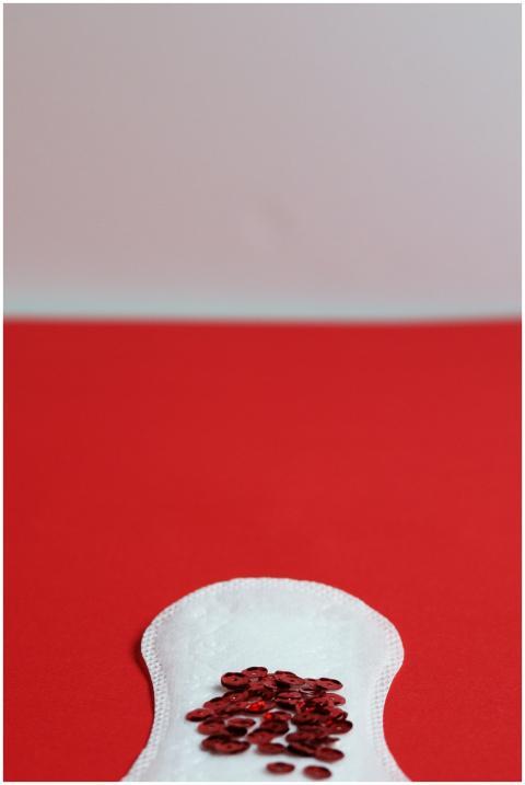 Creative depiction of menstrual cycle with sanitar