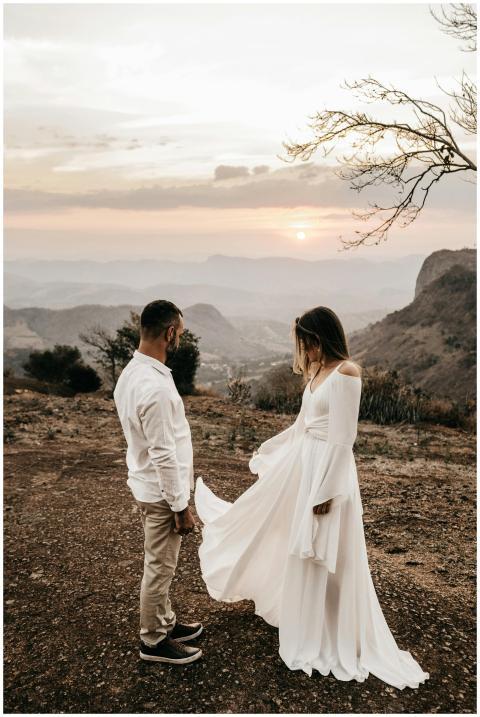 A loving couple in wedding attire share a romantic