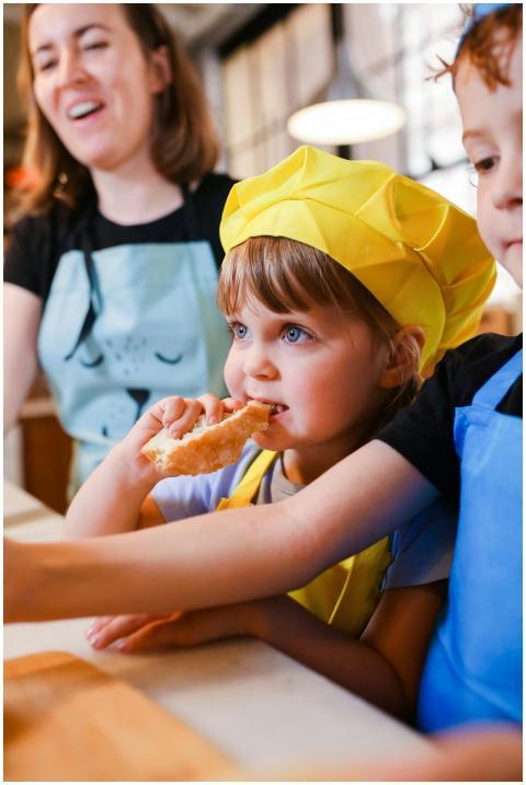 Children and mother bond during a lively cooking s