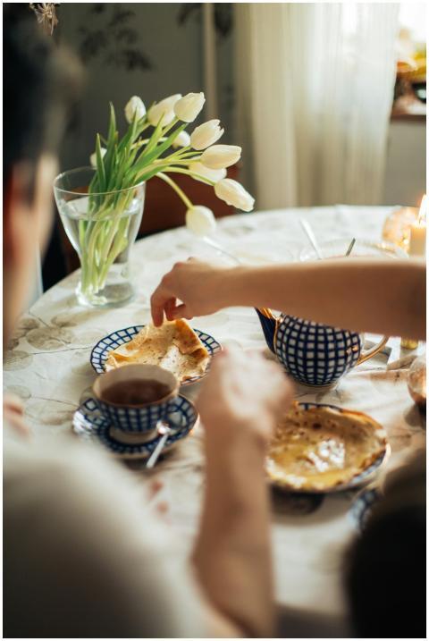 A cozy family breakfast setting featuring crepes,
