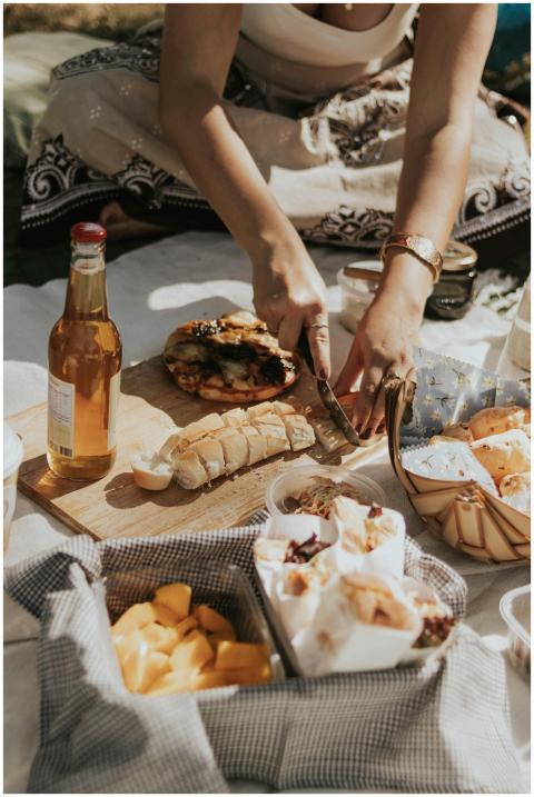 An inviting picnic scene with fresh food and bever