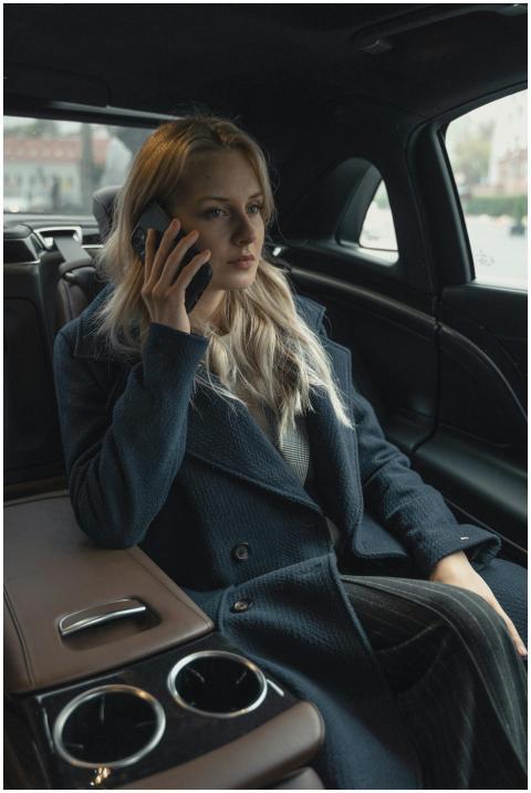 A professional woman talking on her mobile phone w