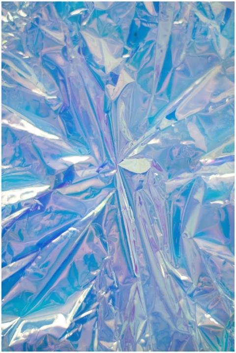 Abstract iridescent blue foil texture ideal for vi