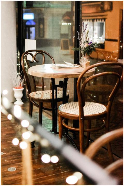 Elegant café setting with classic wooden chairs an
