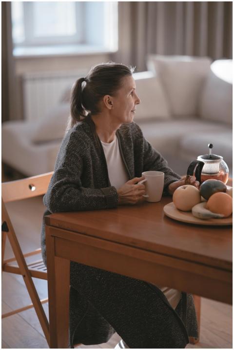 Senior woman enjoying coffee in a cozy home settin