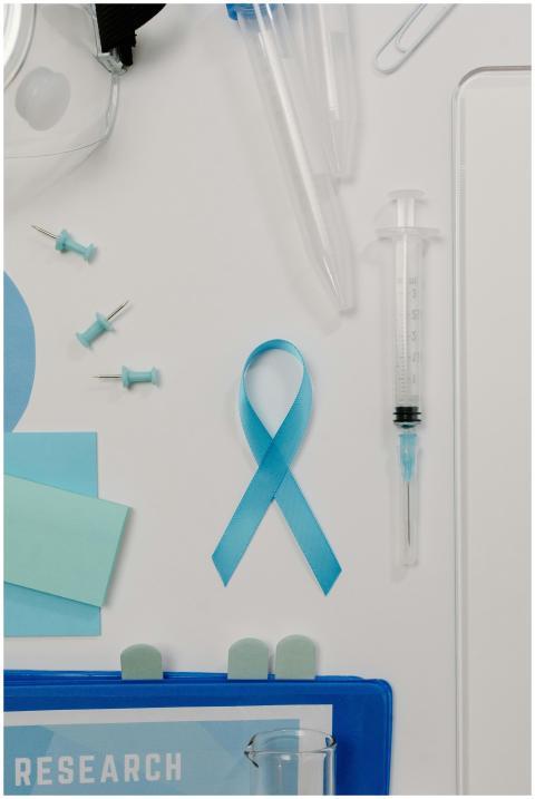Flat lay of medical research supplies with a blue