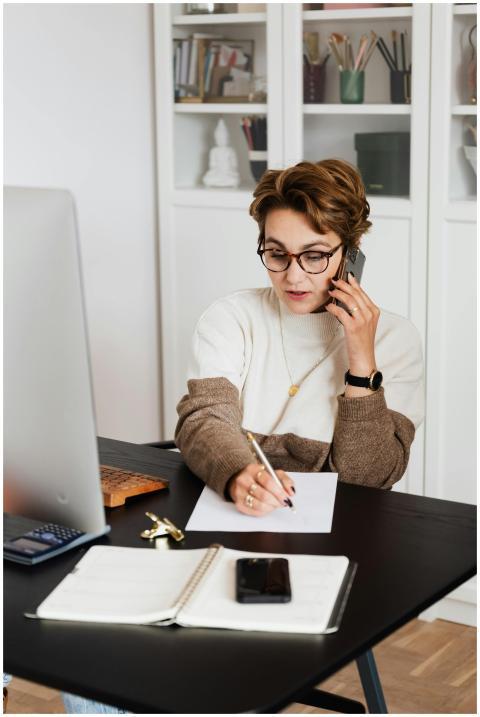 A woman working remotely from home, engaging in a