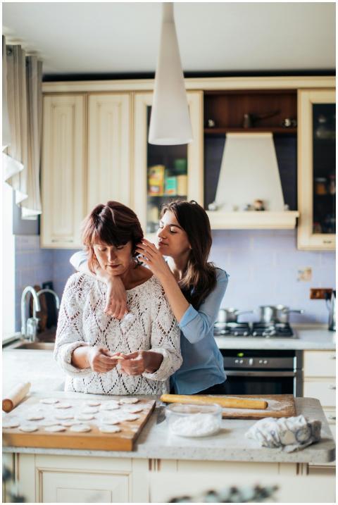 A mother and daughter preparing traditional pelmen