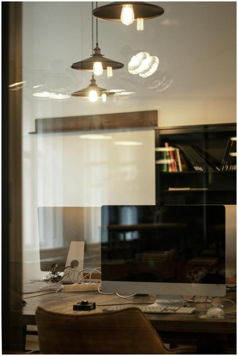 Stylish office setting featuring computers on a de