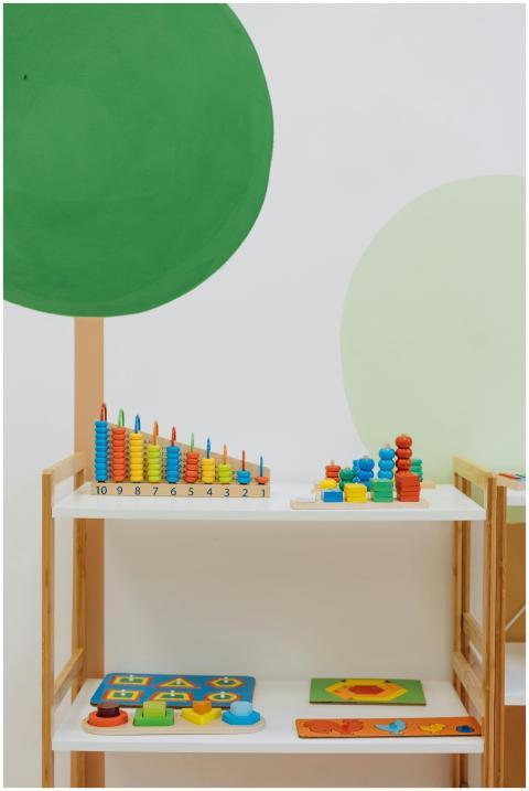 A well-organized indoor playroom filled with color