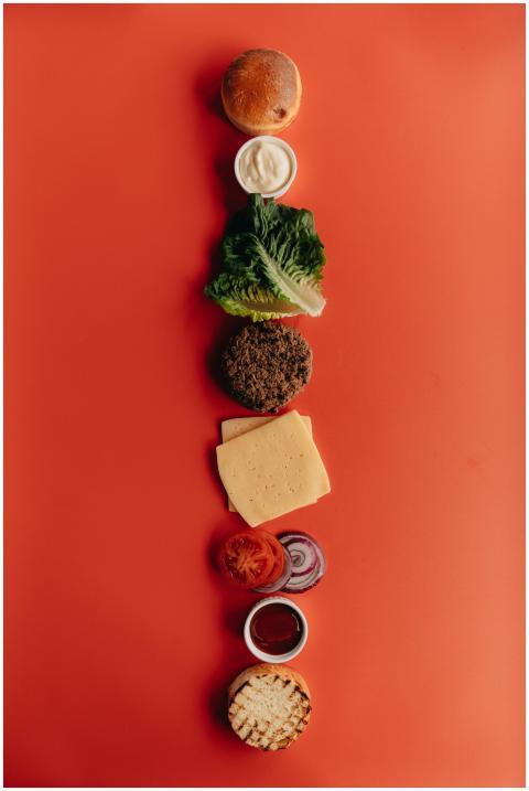 Top-down view of burger ingredients arranged on a
