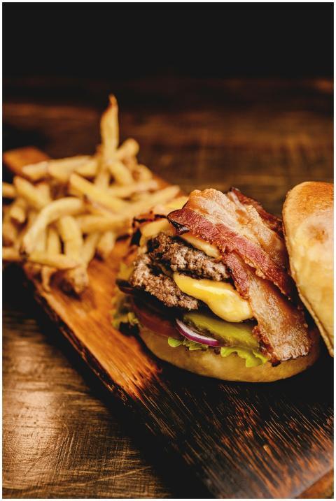 Savor a mouthwatering bacon cheeseburger with cris