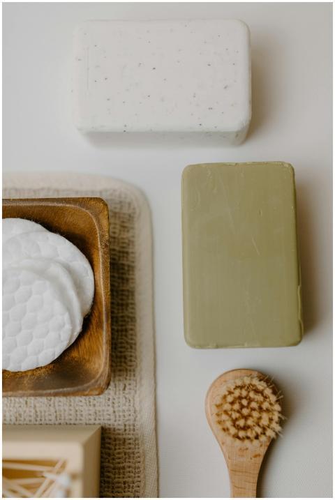A minimalist flat lay of natural bath products inc