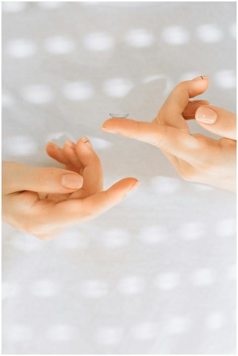 A detailed close-up of hands carefully handling a