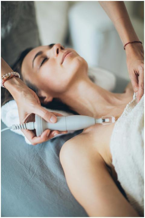 Young woman relaxing during a spa treatment with l