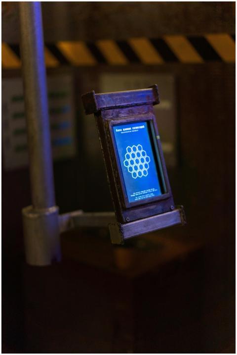 A futuristic device displaying a glowing blue inte