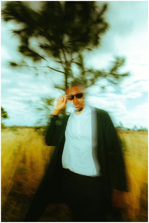 Artistic portrait of a man with sunglasses outdoor