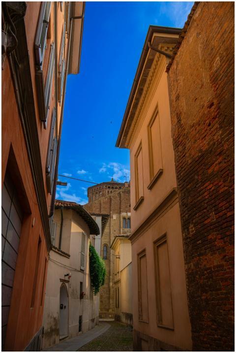 A picturesque narrow street in an Italian town, sh