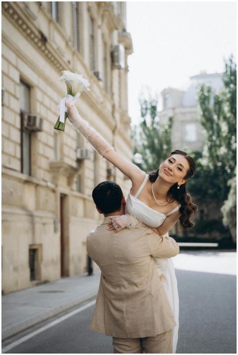 A joyful bride and groom in an elegant wedding sce