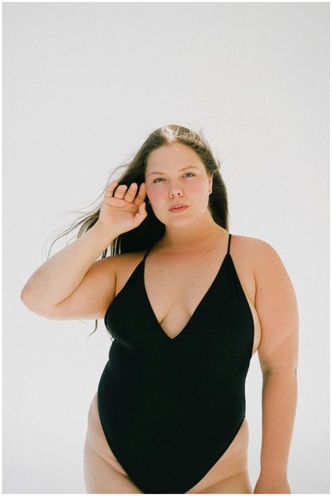 Empowering portrait of a plus-size woman in a blac