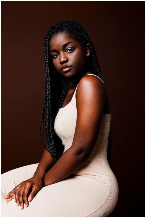 Stylish portrait of a young woman in a bodycon dre