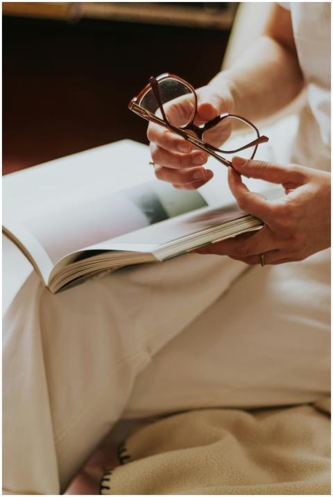 Woman with Eyeglasses and Book