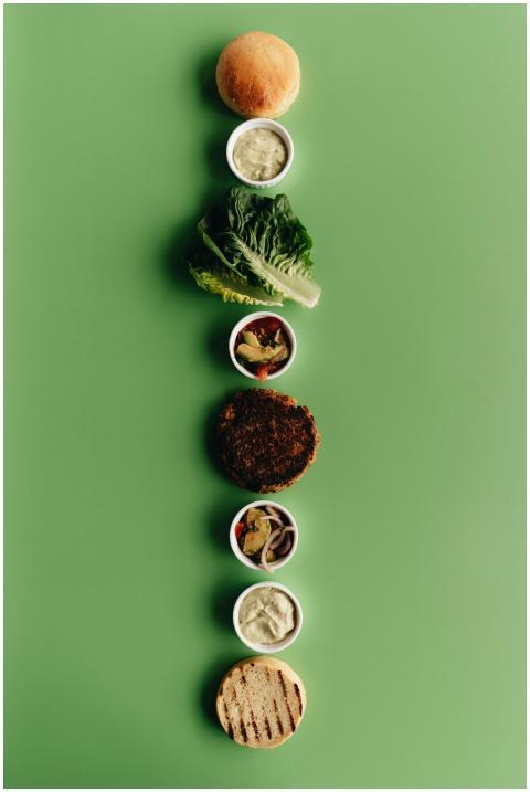 Artistic presentation of a deconstructed burger wi