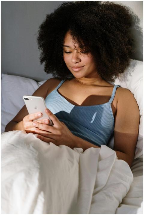 African American woman enjoying a cozy morning in
