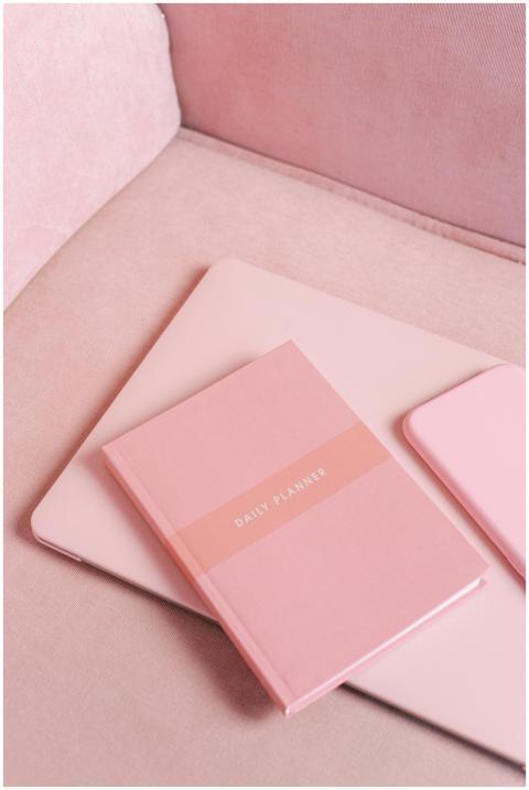 A pink-themed productivity setup featuring a daily