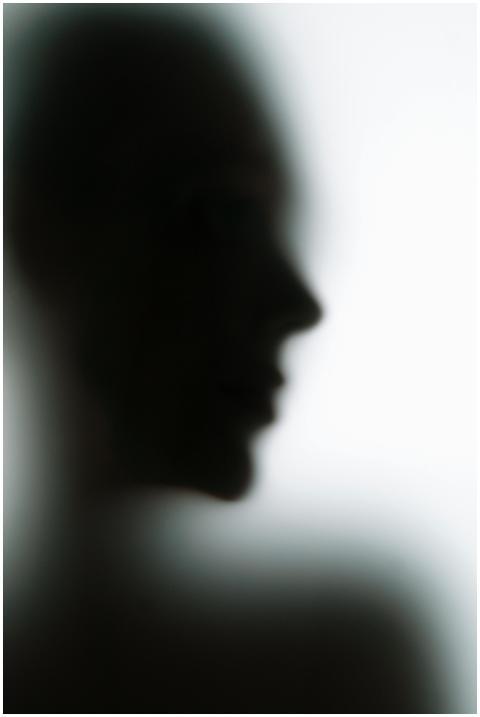 Blurry silhouette of an unidentified person in pro