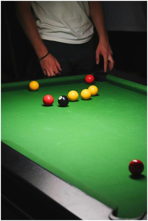 A focused view of a snooker game with vibrant ball