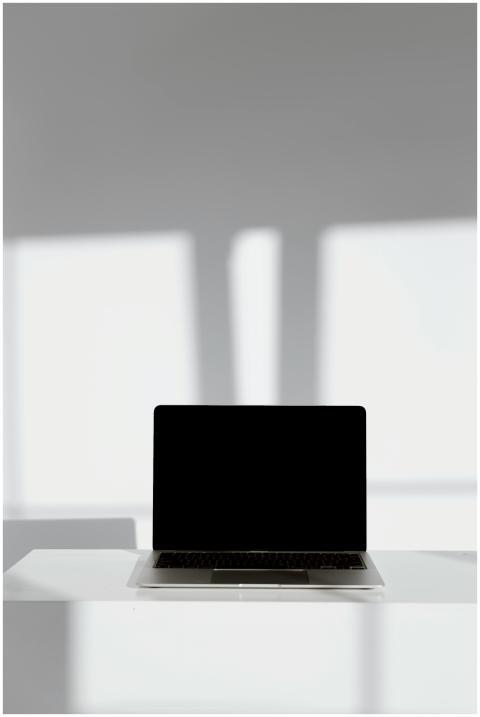 Sleek minimalist laptop with black screen, ideal f