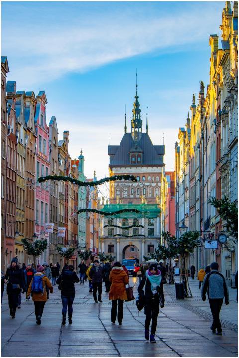 Vibrant street view of Gdansk with people explorin