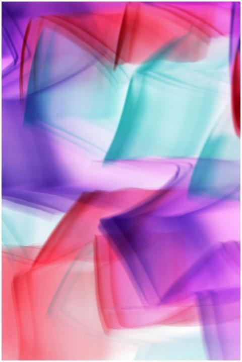 Colorful abstract art featuring fluid waves of pur