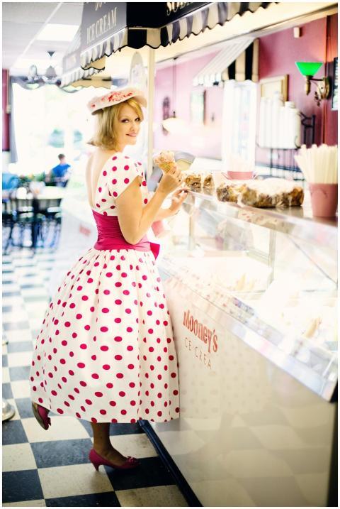 Woman in a vintage polka dot dress enjoying ice cr