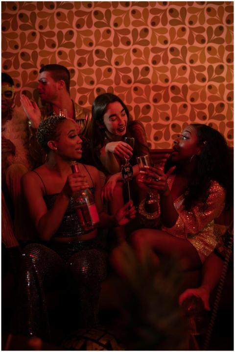 A diverse group of friends enjoying a festive indo