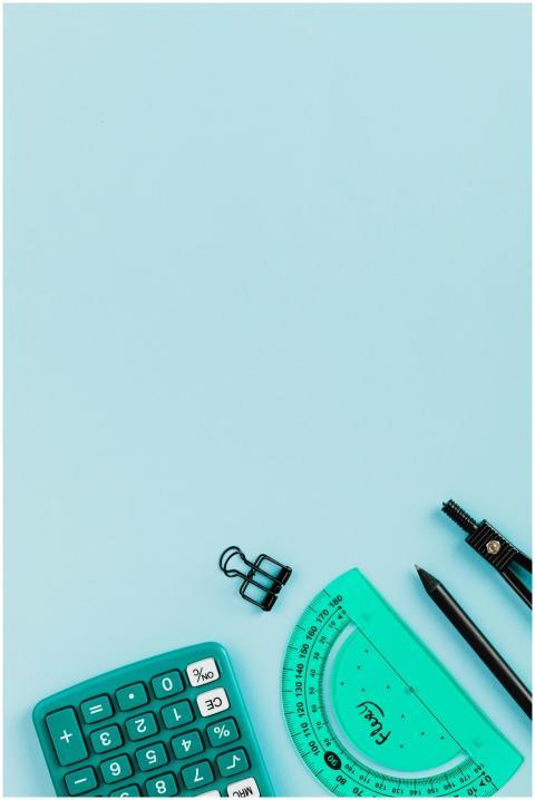 A neat arrangement of office supplies including a