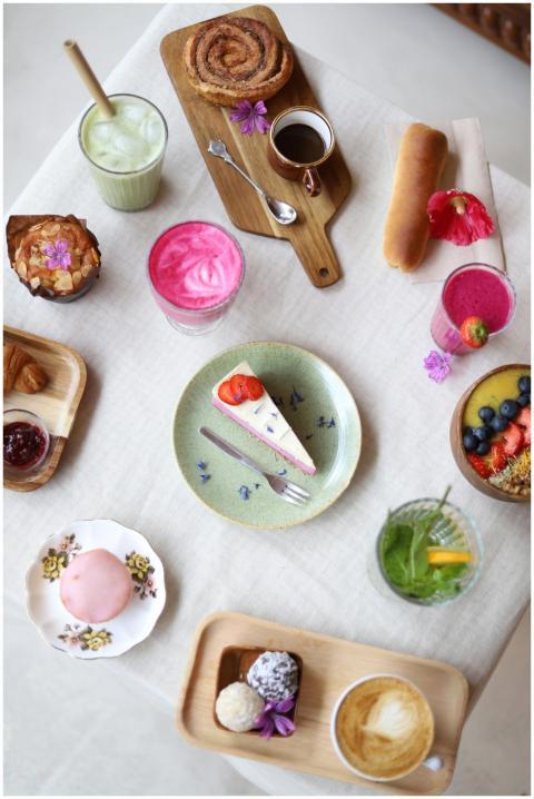 Vibrant flat lay of assorted desserts and beverage