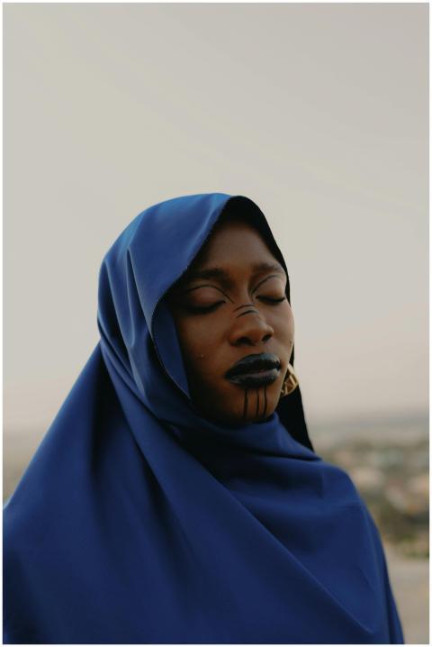 Artistic portrait of a woman in Nigeria, wearing b